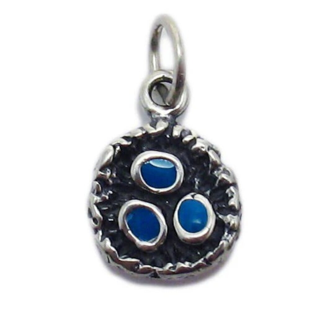 BIRDS NEST CHARM WITH BLUE ENAMEL EGGS IN STERLING SILVER.